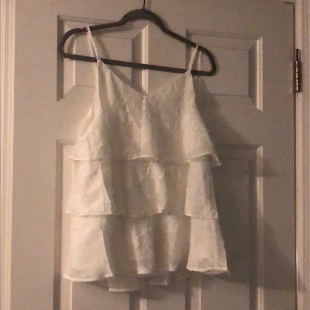 White detailed ruffled tank